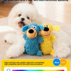 Three plush dog toys in blue, yellow, and white are shown with a color spectrum chart.