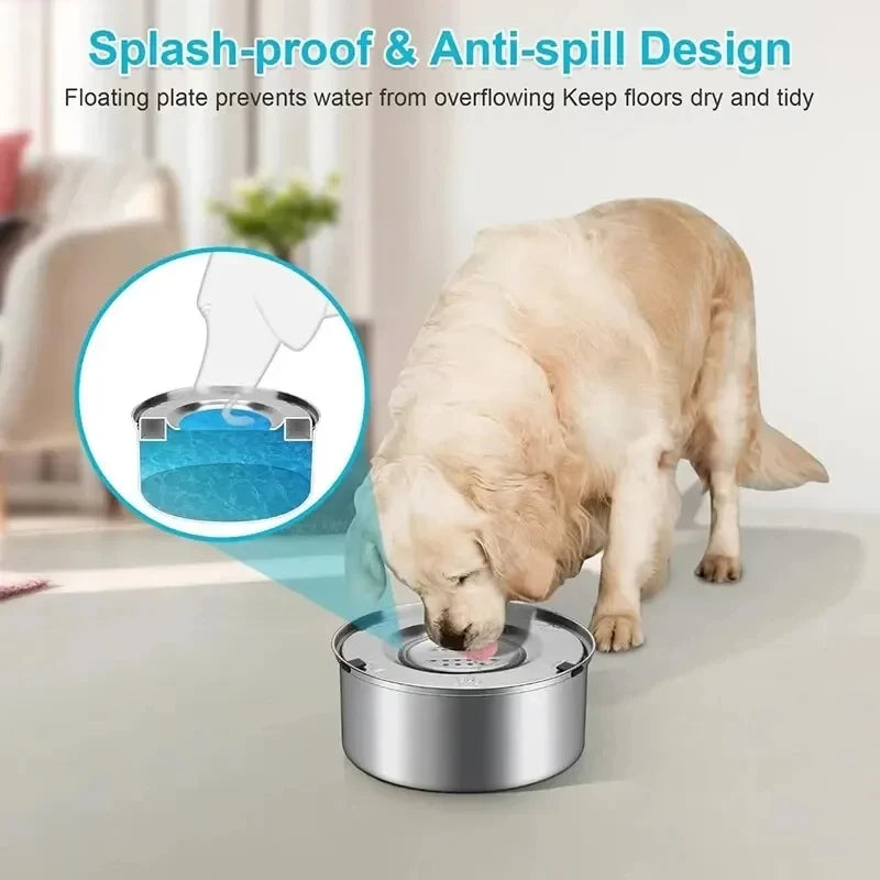 A dog is drinking from a stainless steel water bowl with a floating splash guard on a floor.