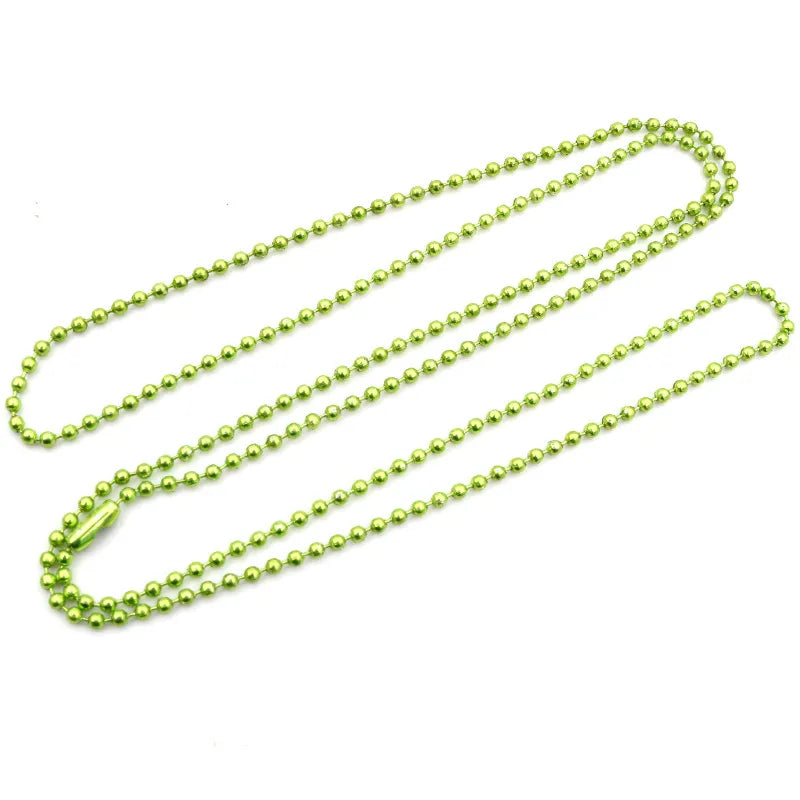A set of ball necklaces with gold and silver plating arranged in multiple strands.