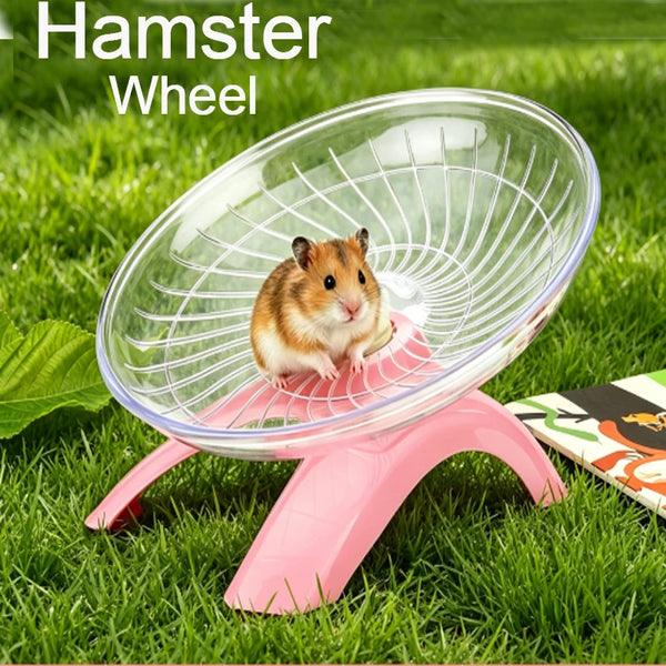 A small brown hamster is exercising in a clear plastic wheel on pink stand grass.