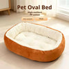 A plush, oval pet bed in a warm brown color with a white rim, made from high-resilient PP cotton.
