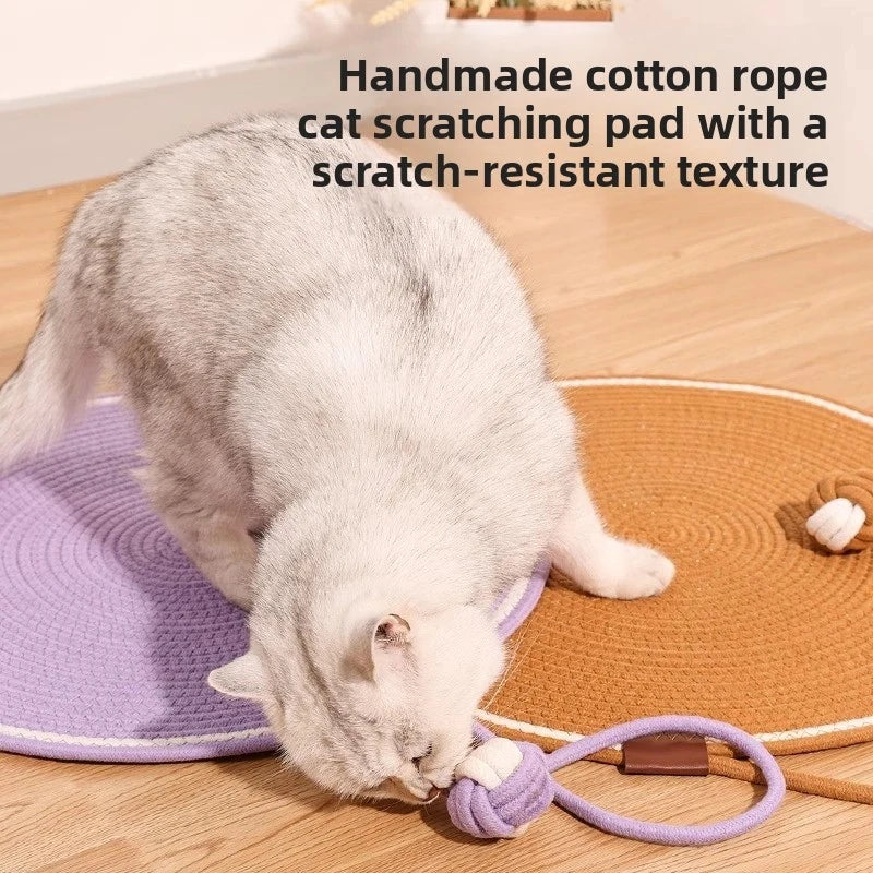 A gray cat is using a handmade cotton rope cat scratching pad with a scratch-resistant texture.