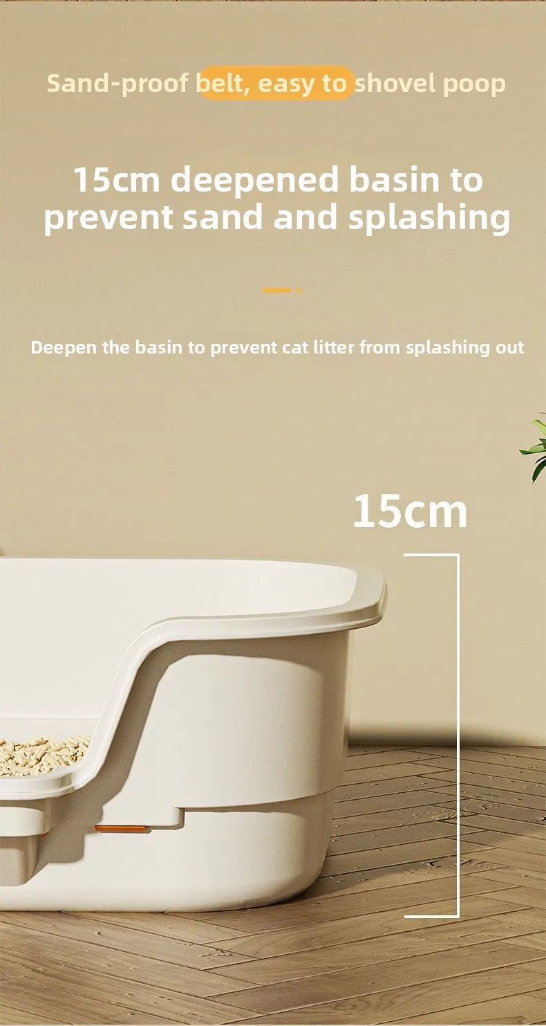 A white semi-enclosed cat litter box with a deepened basin, shown on a wooden floor.