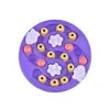 Purple interactive puzzle slow feeder bowl with various shaped silicone inserts for pets