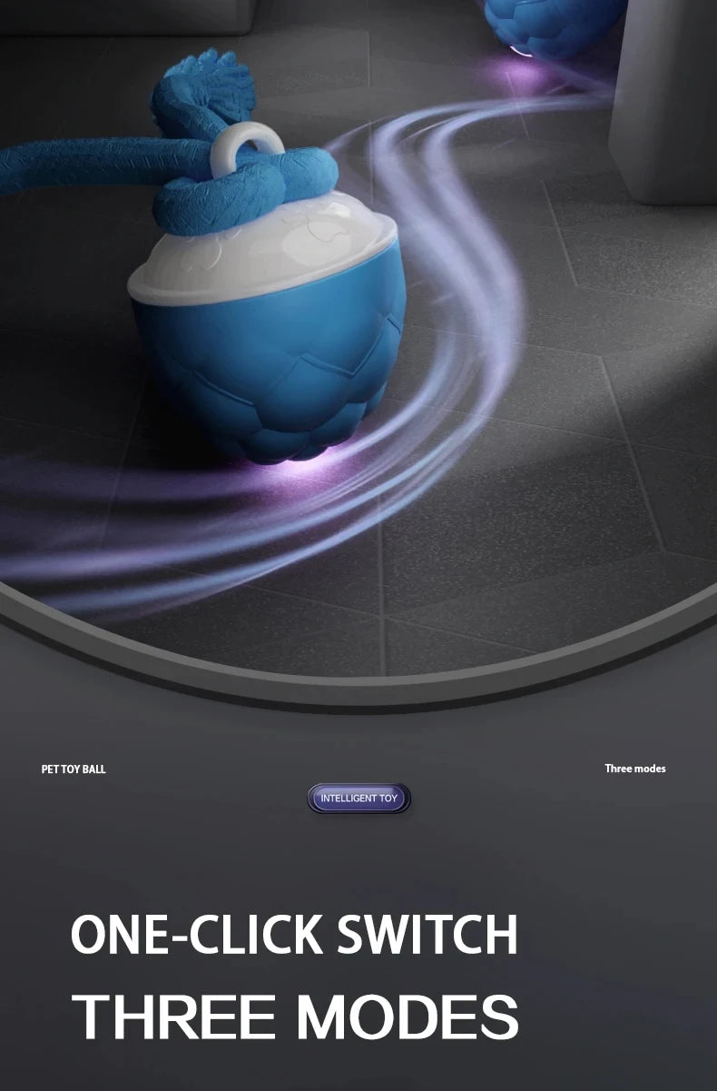 A blue and white interactive rolling dog toy ball is shown in motion on a gray surface.
