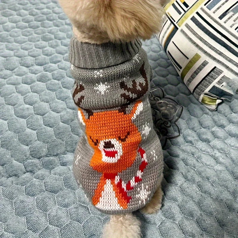 A knitted pet sweater for a dog, featuring an orange and white festive design on a gray background.
