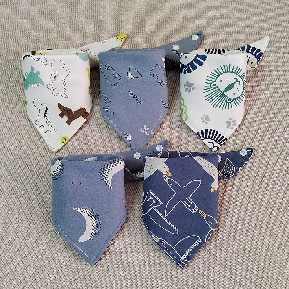 A set of five cotton triangle baby bibs featuring various cartoon animal and nature prints in light blue and white.