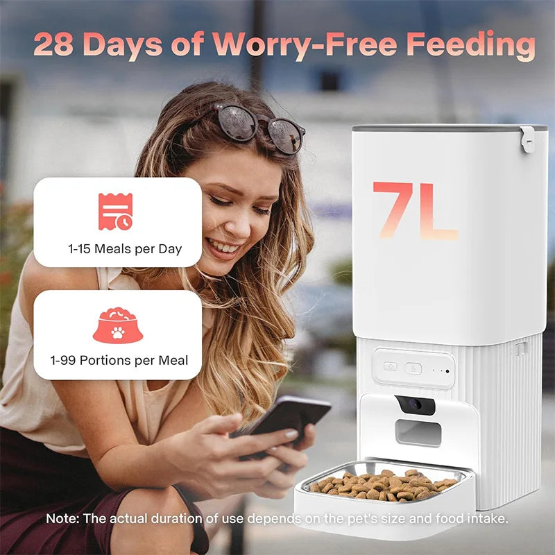 A woman is using a smart pet feeder device with stainless steel bowls, demonstrating its use for worry-free feeding.