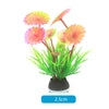 A small potted plant with pink and yellow flowers used for aquarium decor.