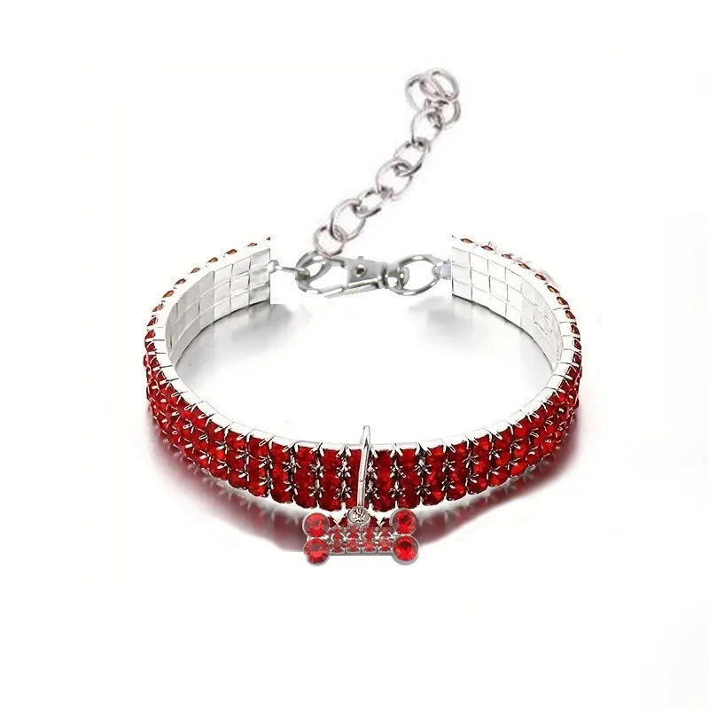 Red crystal rhinestone dog collar with a silver chain and quick release buckle