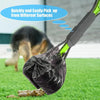 A black pet poop scooper with a long handle is shown picking up dog waste on green grass.