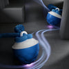 A blue interactive rolling dog ball is shown in motion on a gray floor, with light trails indicating movement.