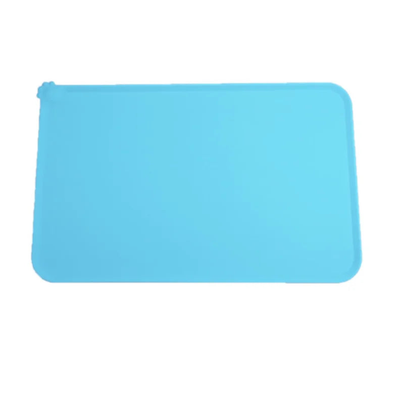 A light blue waterproof silicone pet feeding mat.