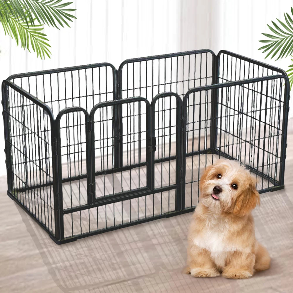 A black foldable pet playpen with multiple panels is shown on a light wooden floor.