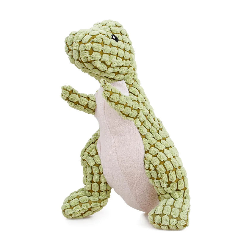 A plush, green, animal-shaped squeaky dog toy with a corduroy cover.
