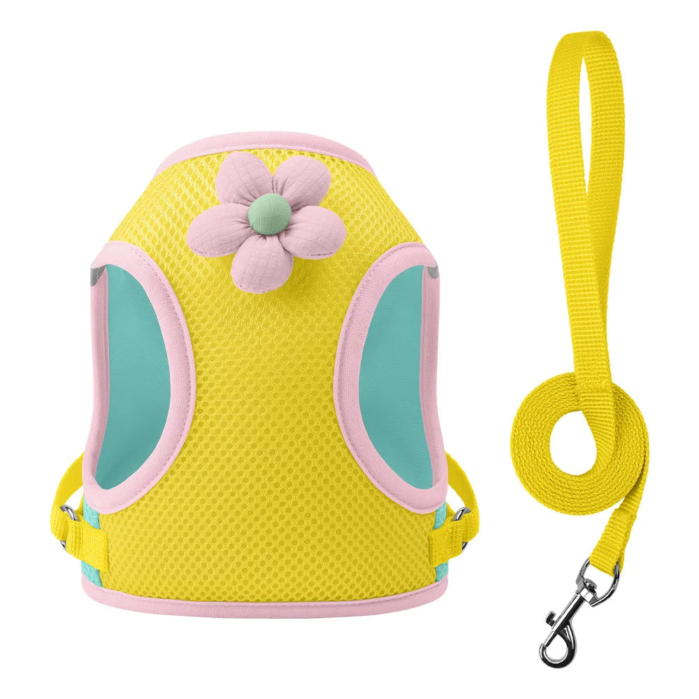 Yellow mesh dog harness with pink floral accent and matching yellow leash