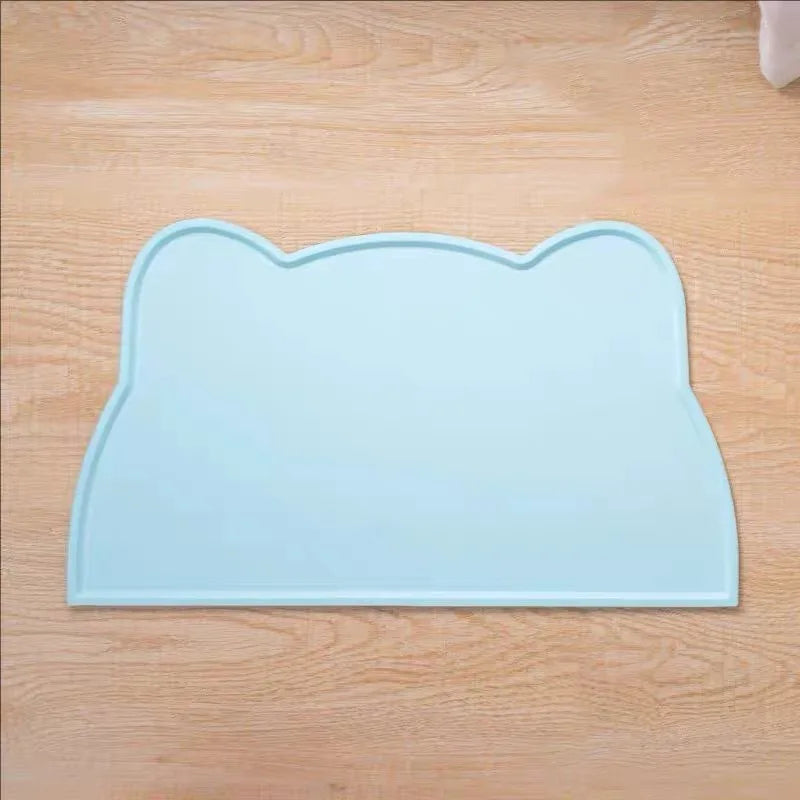 Light blue silicone cat face pet feeding mat for food and water bowls