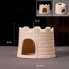 A beige ceramic aquarium shrimp hideaway cave structure shown from the front and top views.