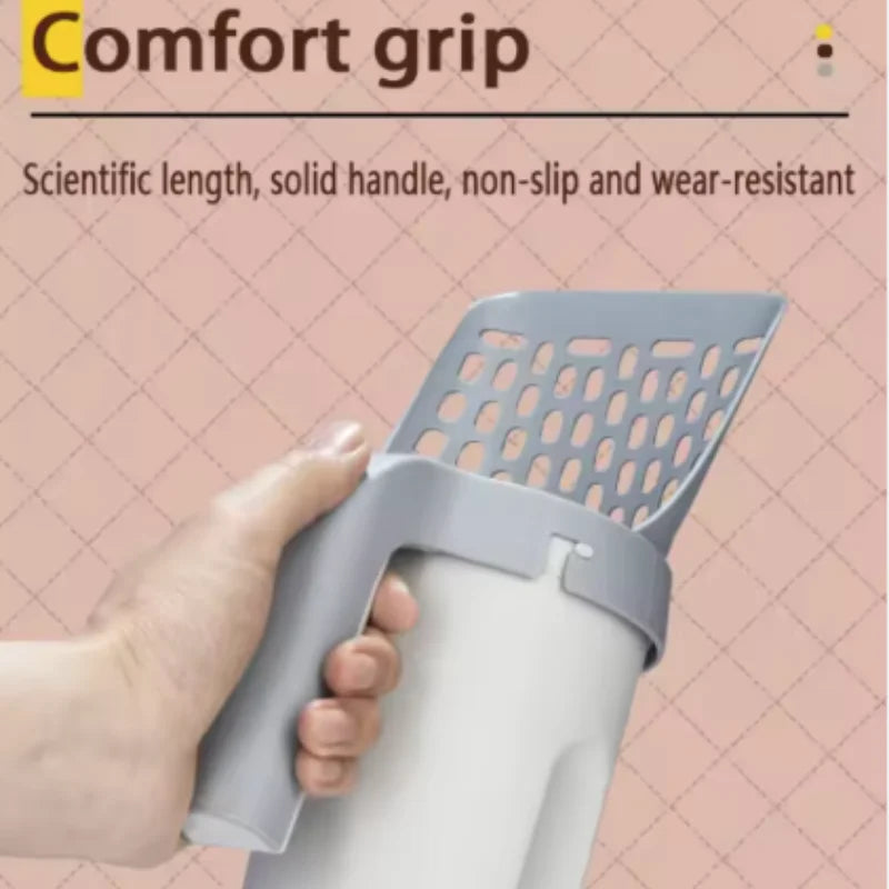 A hand is holding a gray and white self-cleaning cat litter scoop with a mesh filter.