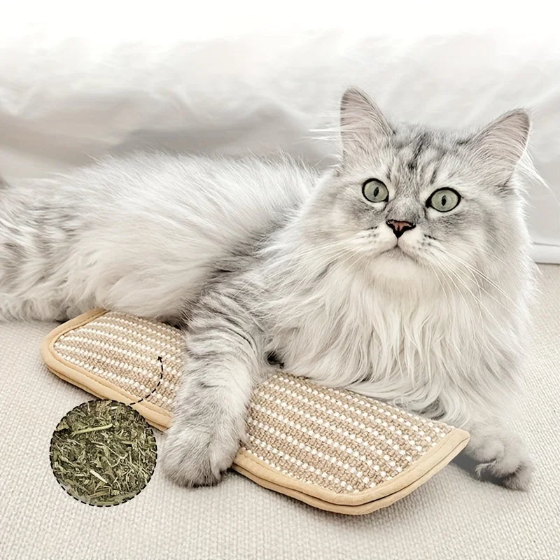 A fluffy gray cat is lying on a natural fiber hemp scratching pad and lounger.