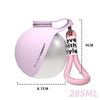 A pink portable stainless steel dog water dispenser with a handle and measuring markings.