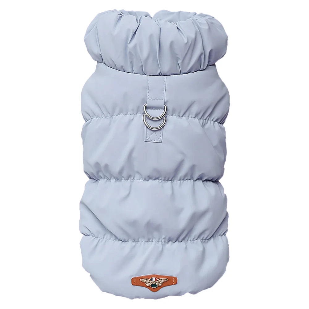 Manteau d'hiver pour chien bleu clair rembourré avec capuche et patch à l'ourlet