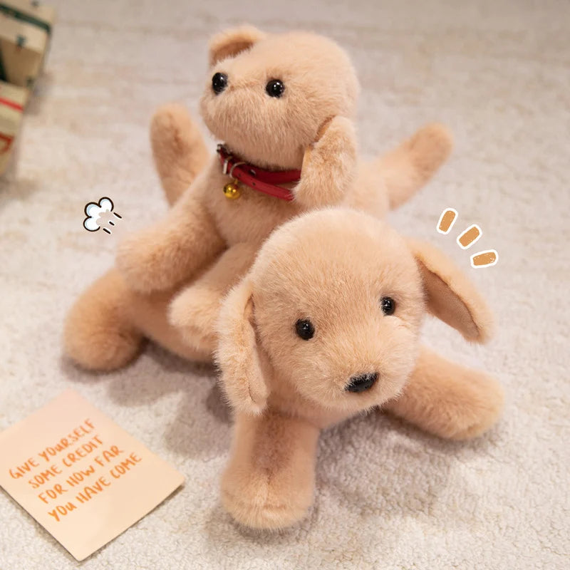 A light tan realistic Labrador plush toy lying on a beige carpet with a credit card visible nearby.