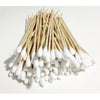 A bundle of white cotton swabs with light brown shafts arranged in a conical shape.