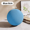 A blue sisal cat toy ball with a rattle, shown on a table.