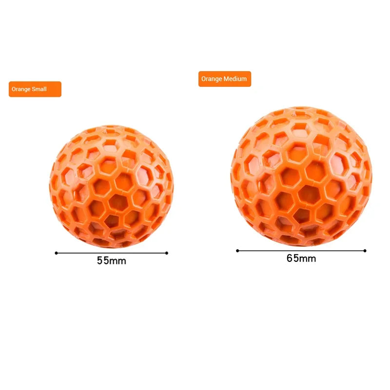 Honeycomb squeaky dog toy balls in orange, showing small and medium sizes.