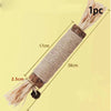 A bundle of natural fiber catnip chew stick with a squeaker, showing its length and texture.
