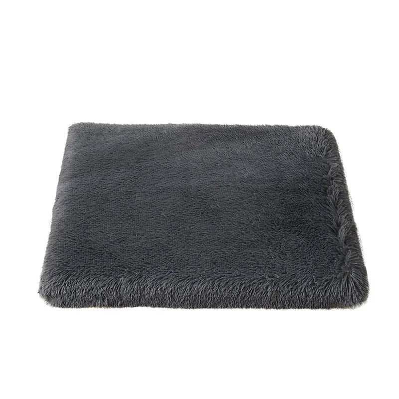 A dark gray, fluffy plush pet bed designed for small and large dogs and cats.