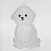 A clear, round pet hair storage keychain shaped like a dog sitting.