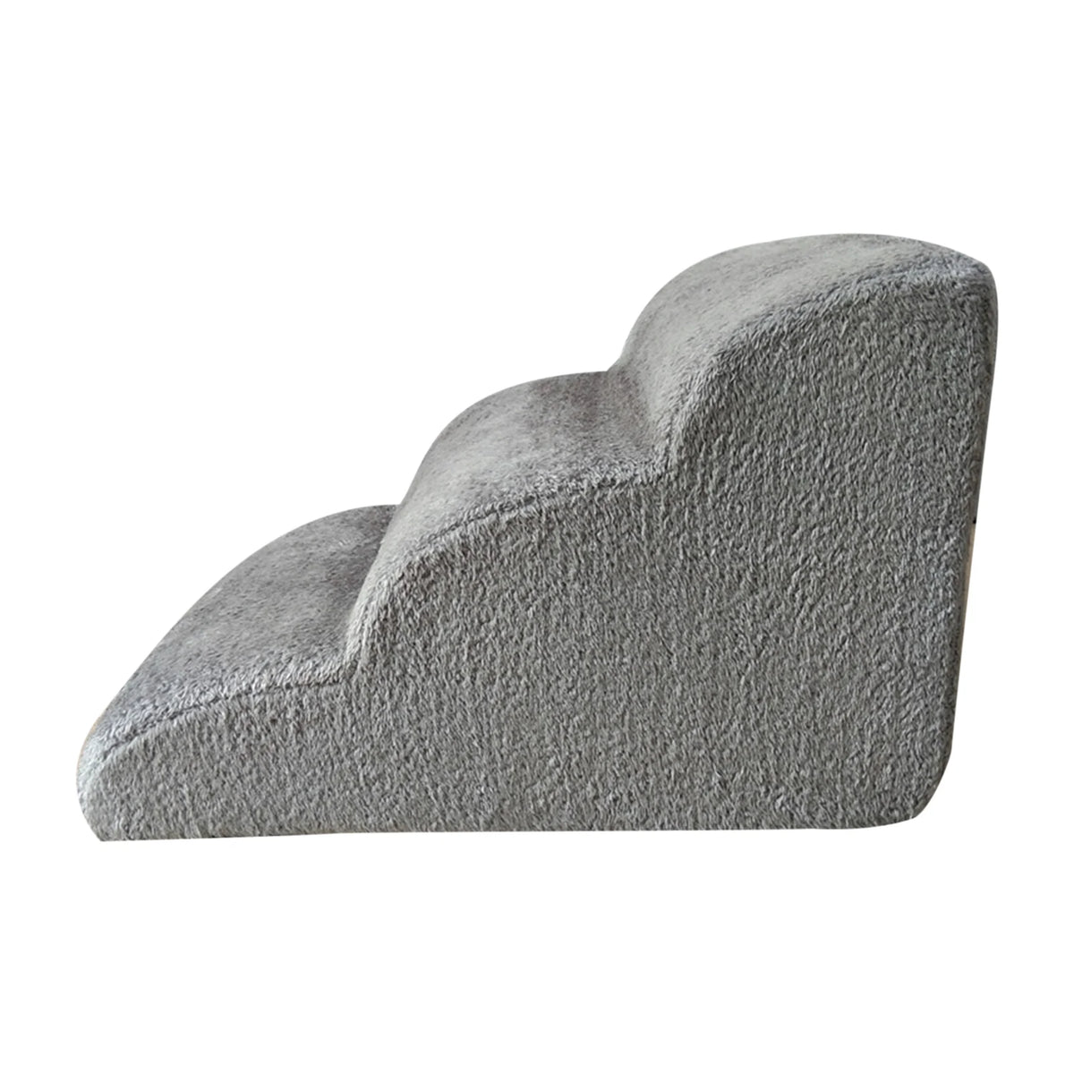 A gray, sculpted 3-tier non-slip pet step for beds and sofas.
