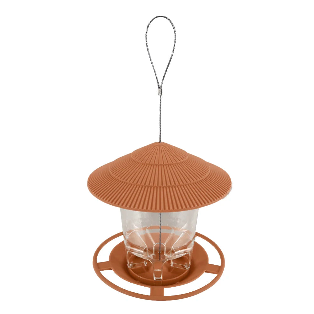 Window-mounted bird feeder with a clear viewing panel and an orange dome.