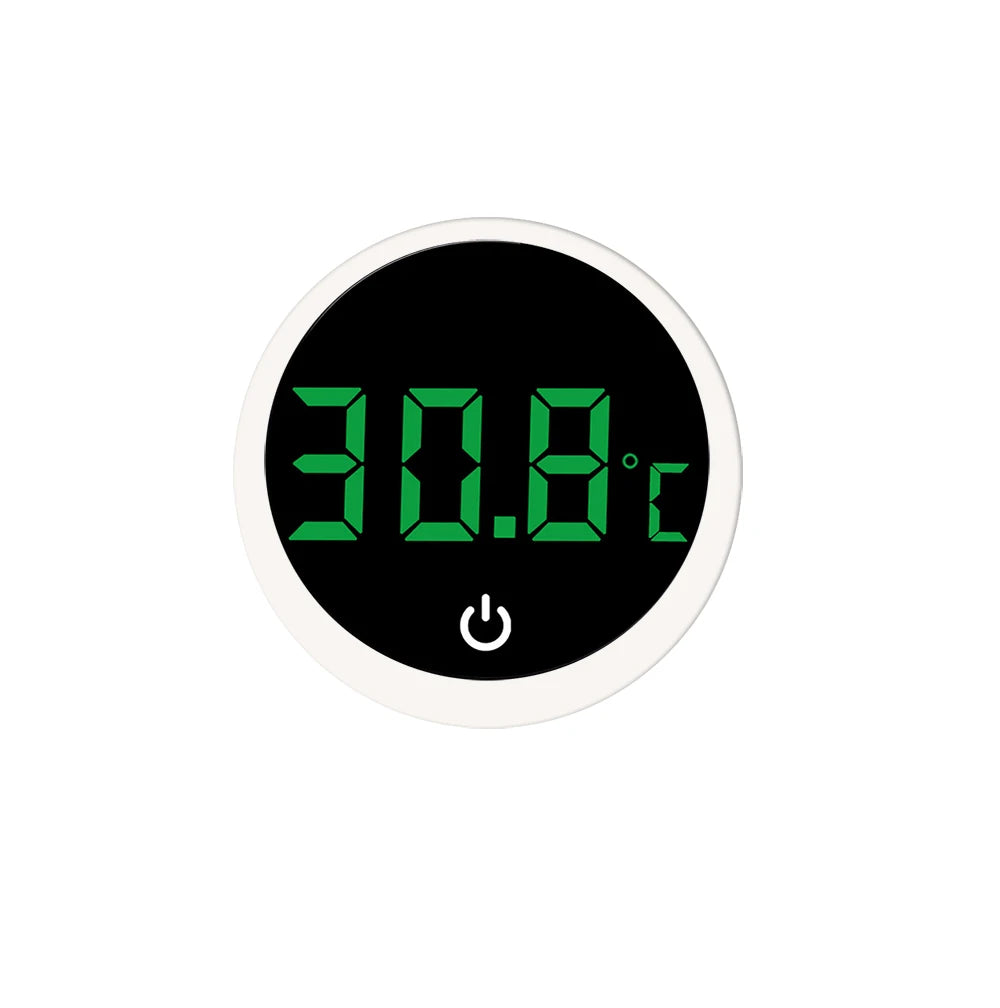 A round digital thermometer display showing 30.8 degrees Celsius on a black background.