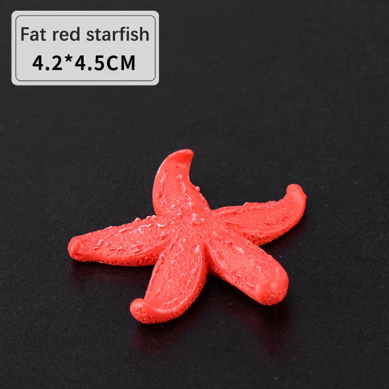 A bright red starfish decoration made of resin, measuring 4.2 by 4.5 cm.