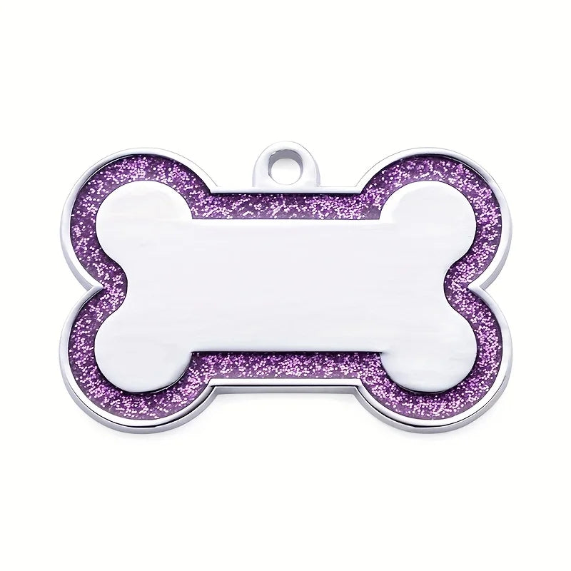 Silver pet ID tag with a bone shape, featuring purple glitter and a blank engraved area.