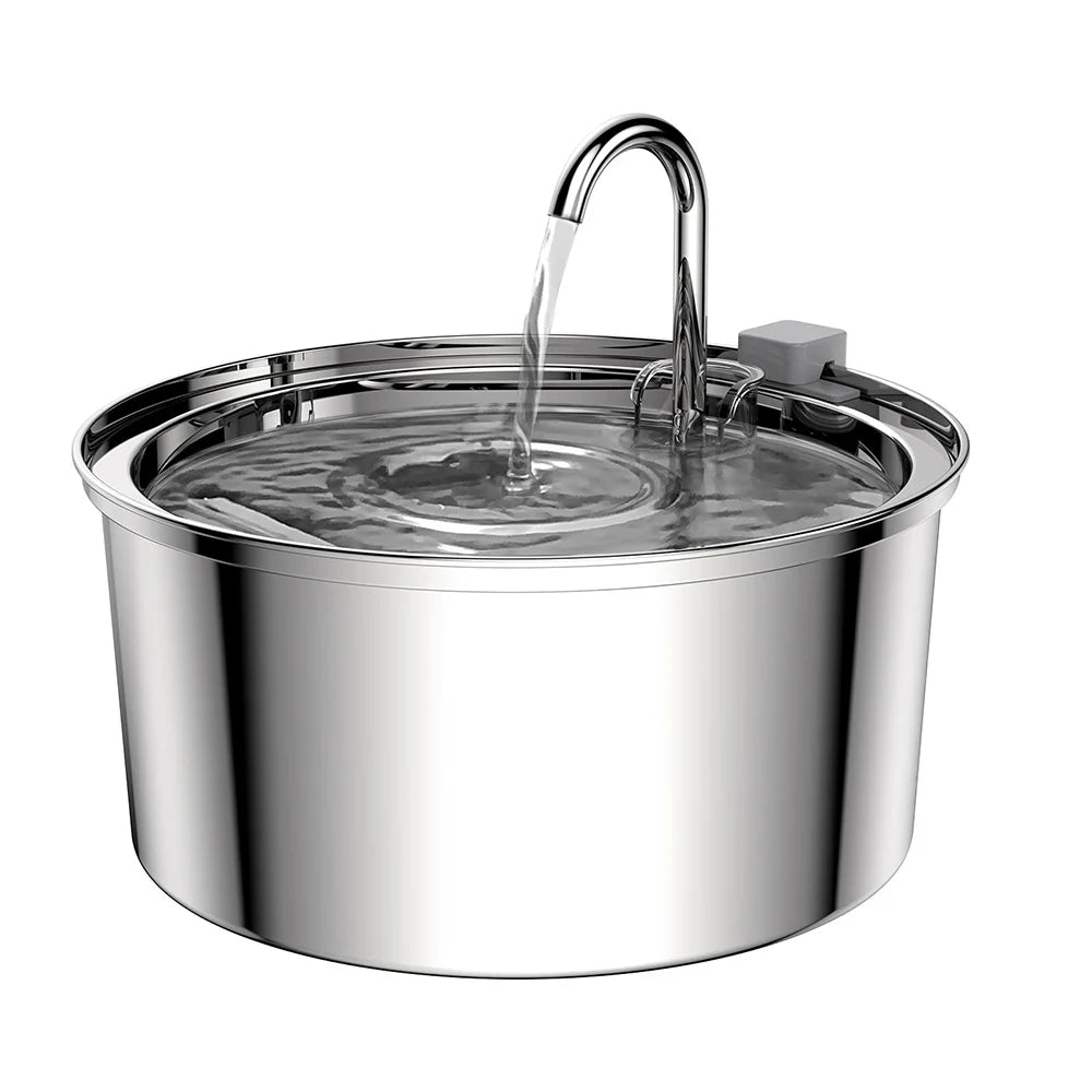 Stainless steel pet water fountain with a visible water stream flowing from the spout