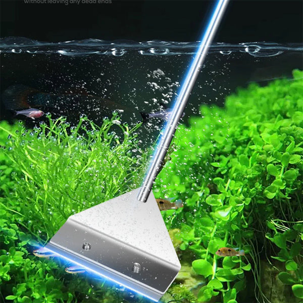 A silver aquarium glass scraper with a blue light is shown cleaning green aquatic plants underwater.