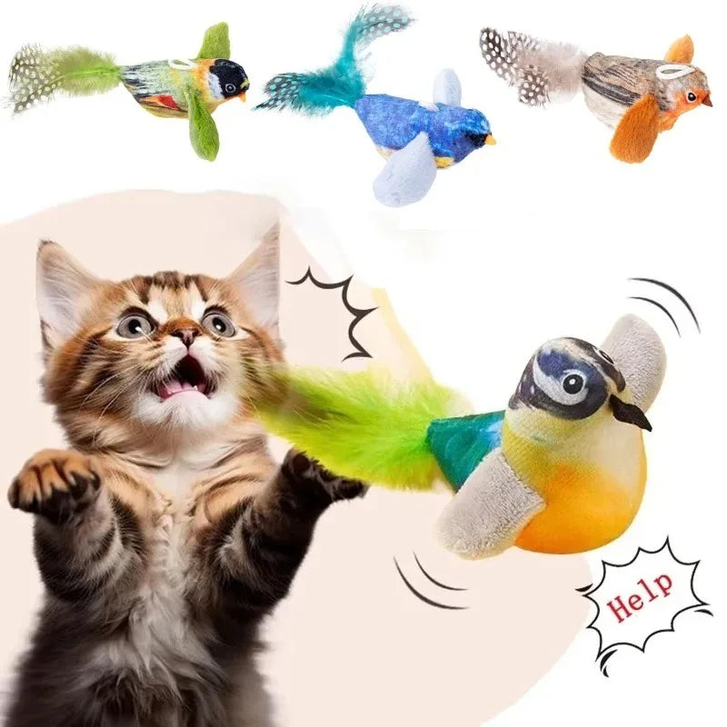 A cat is playing with a colorful toy featuring birds and an elastic rope.