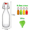 Un set de huit bouteilles à couvercle en verre de 8,5 oz dans diverses couleurs, dont orange, vert, jaune et rouge.
