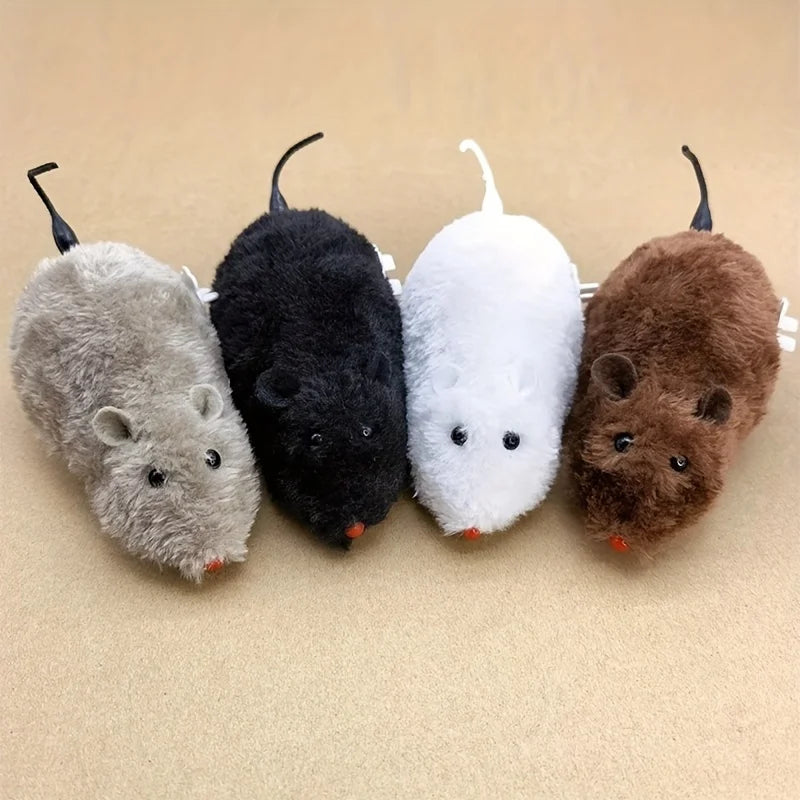 Four wind-up plush mouse toys in gray, black, white, and brown fur