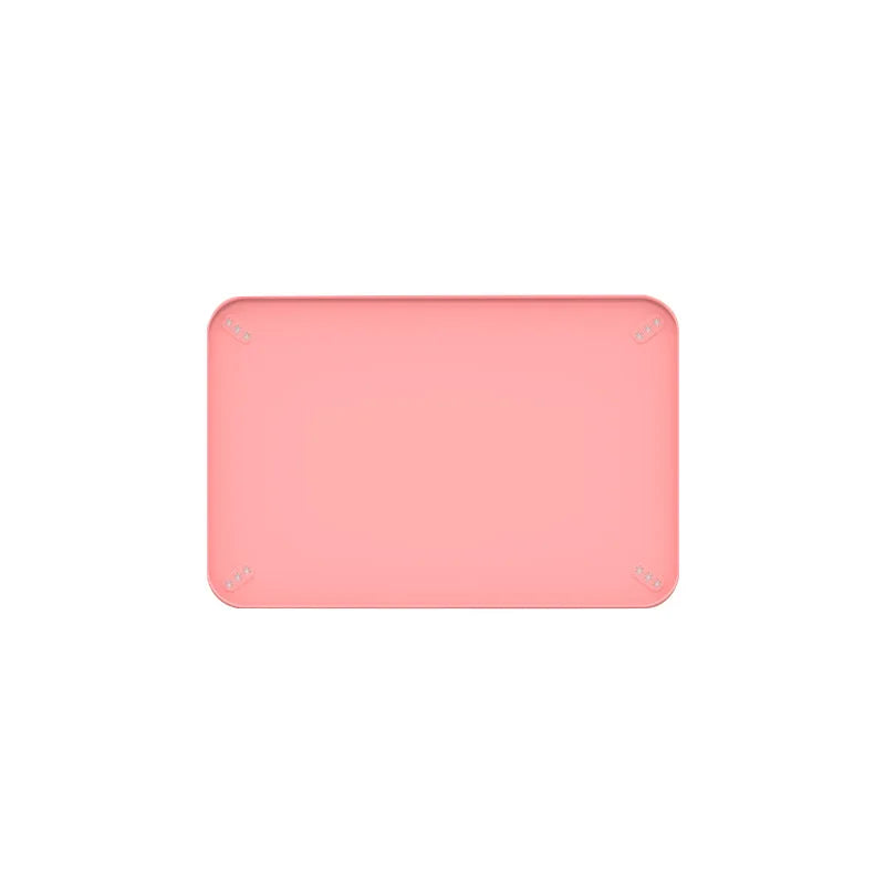 A pink silicone dog pee pad holder with raised edges.