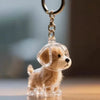 A clear plastic dog figurine with a hanging keychain charm.