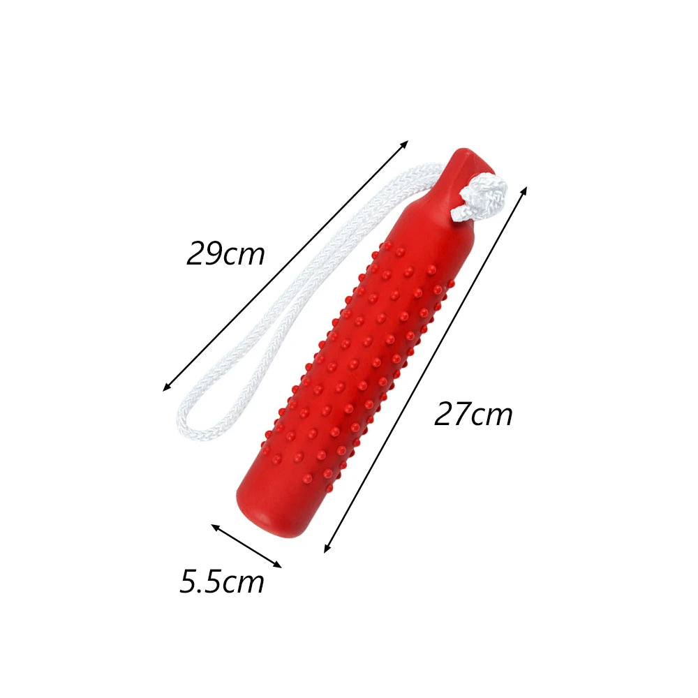 A red, cylindrical dog chew toy with a string attached, showing its dimensions.