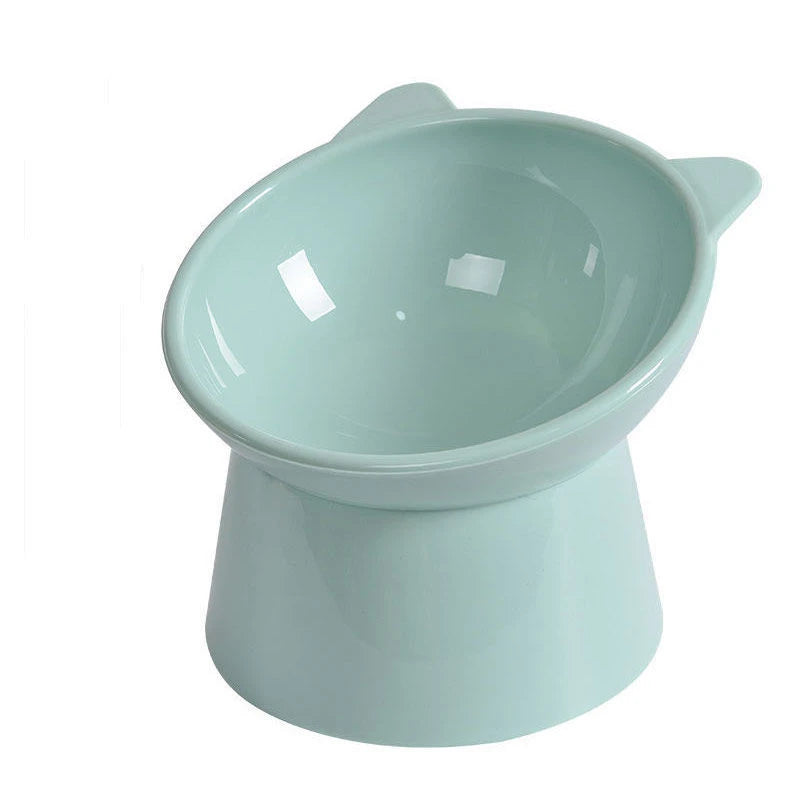 A light blue ceramic pet bowl with an elevated design and storage base.