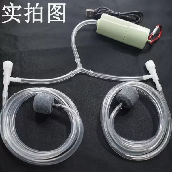 A clear tubing system with an electronic pump and two silicone aerators for a portable aquarium oxygen device.