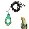 A green adjustable parrot harness and black elastic leash set with a yellow parrot.