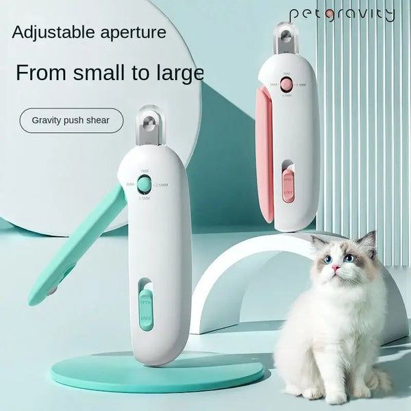 A white gravity push shear pet nail clipper is shown next to a cat, demonstrating its adjustable aperture feature.
